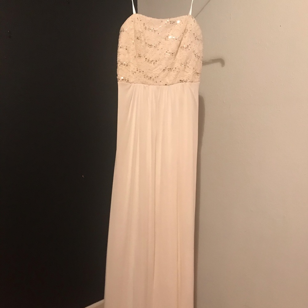 White top with sequins and a long bottom